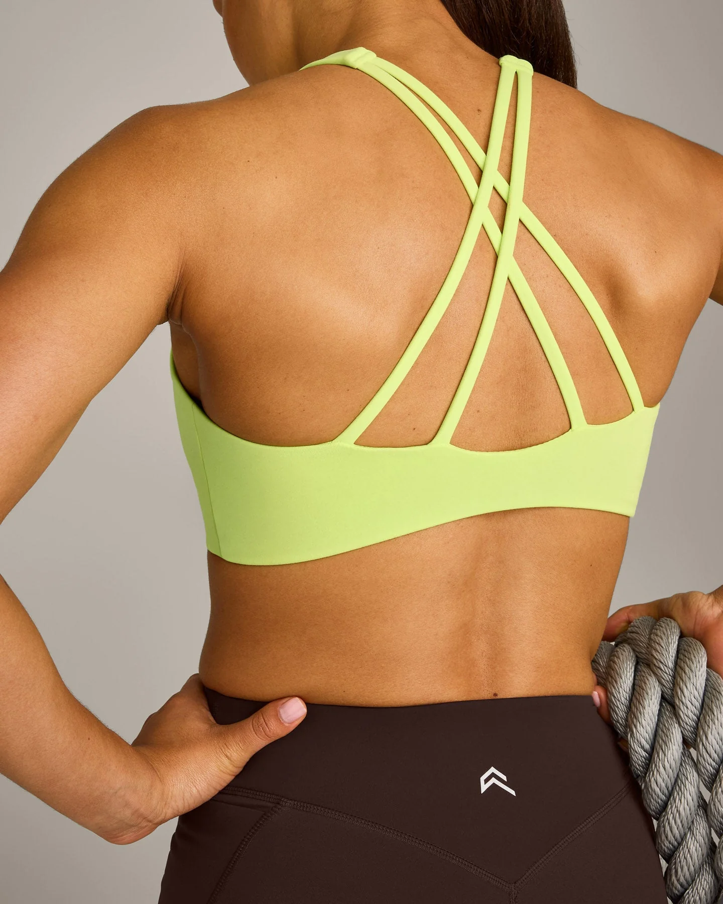 EasyLift™ High Neck Sports Bra with Grey Logo | Citrus Green - Image 6
