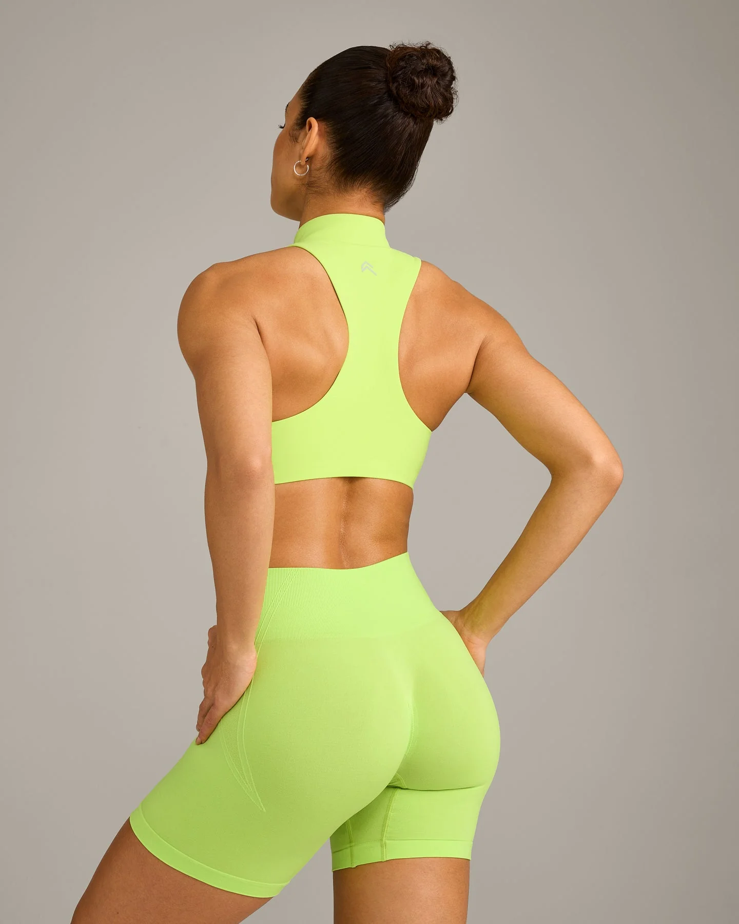 EasyLift™ Zip High Neck Sports Bra with Grey Logo | Citrus Green - Image 2