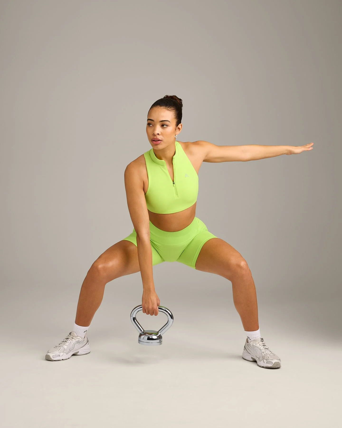 EasyLift™ Zip High Neck Sports Bra with Grey Logo | Citrus Green - Image 3