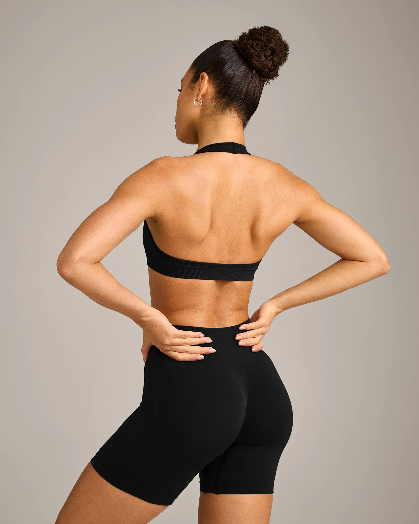 EffortlessLift⢠Seamless Halter Neck Sports Bra with Grey Logo | Black - Image 6
