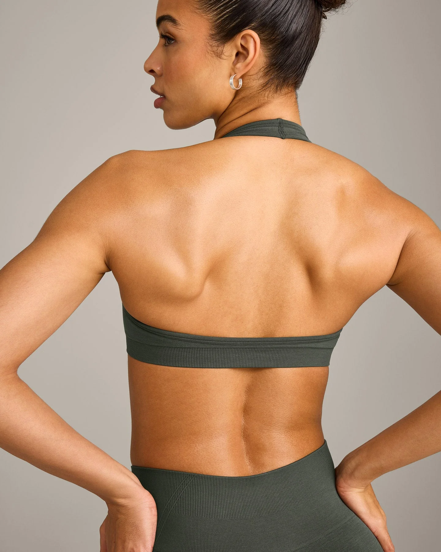 EffortlessLift™ Seamless Halter Neck Sports Bra with Grey Logo | Dark Khaki - Image 2