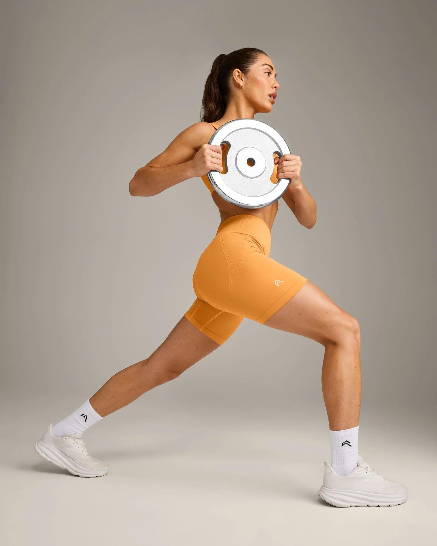 EffortlessLift™ Seamless Mid Rise Shorts with Grey Logo | Powdered Orange - Image 3