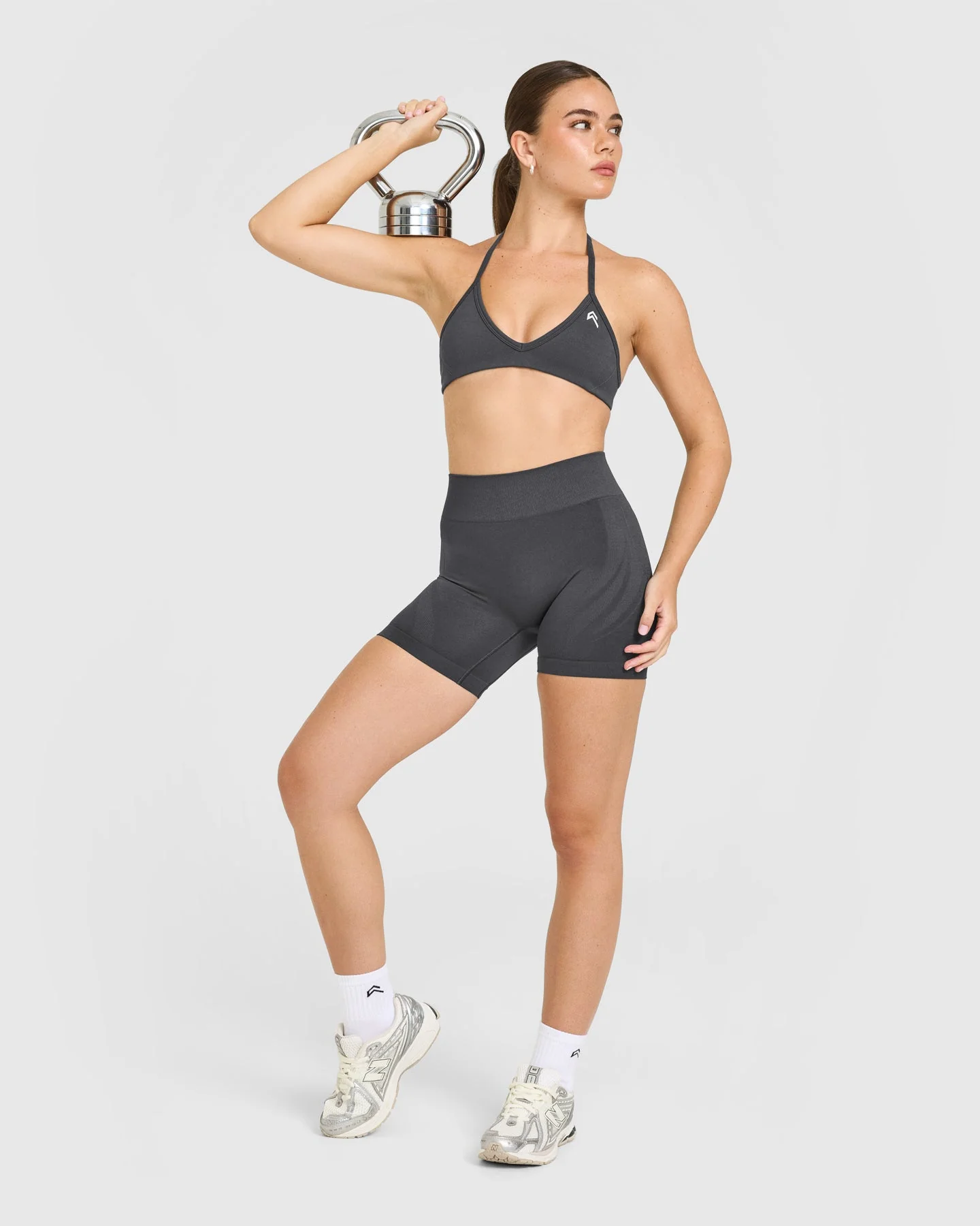 EnhanceLift™ Seamless Minimal Halter Neck Bralette with White Logo | Coal - Image 3