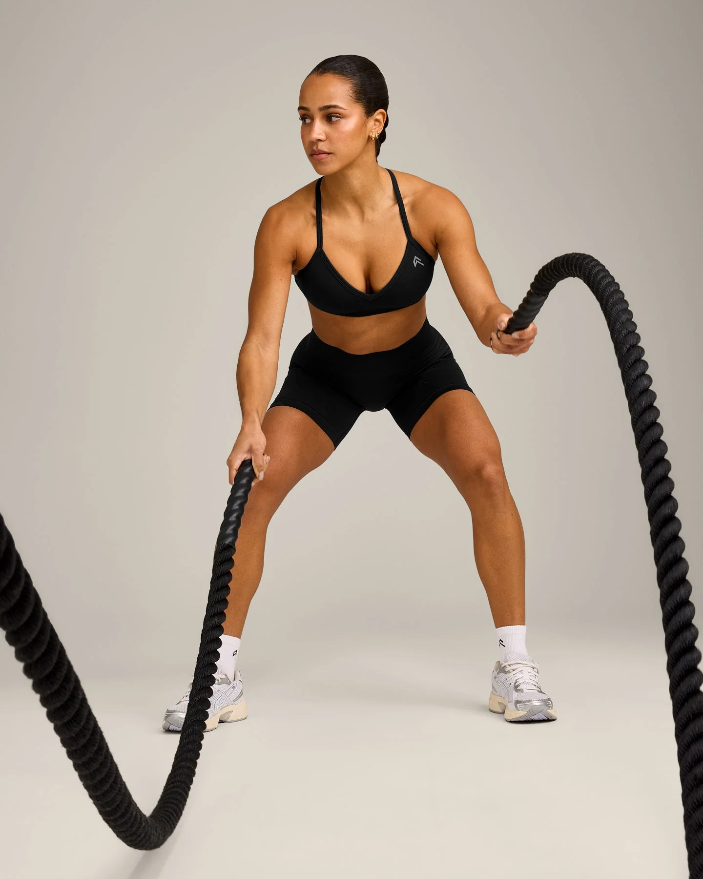EnhanceLift™ Seamless Strappy Sports Bra with Grey Logo | Black - Image 3