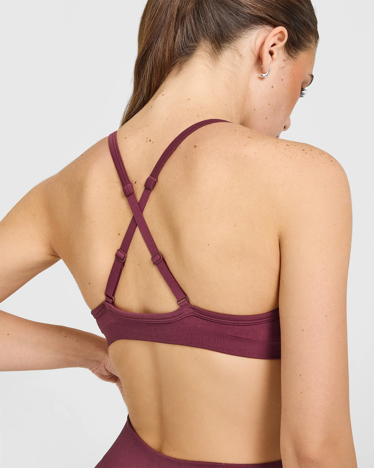 EnhanceLift™ Seamless Strappy Sports Bra with White Logo | Burnt Maroon - Image 4