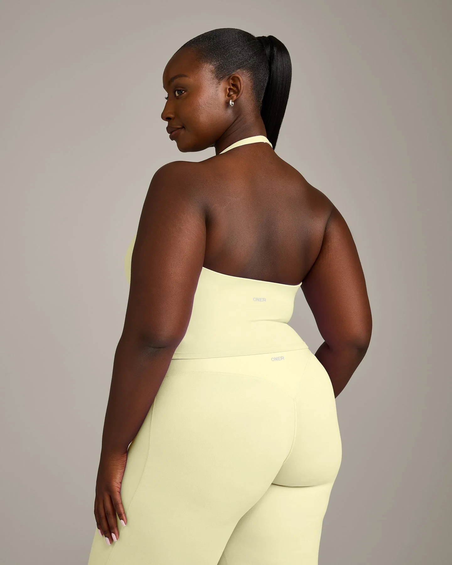 SoftMotion™ Halter Neck Mid Vest with Built in Bra Shelf with Grey Logo | Pastel Yellow - Image 2