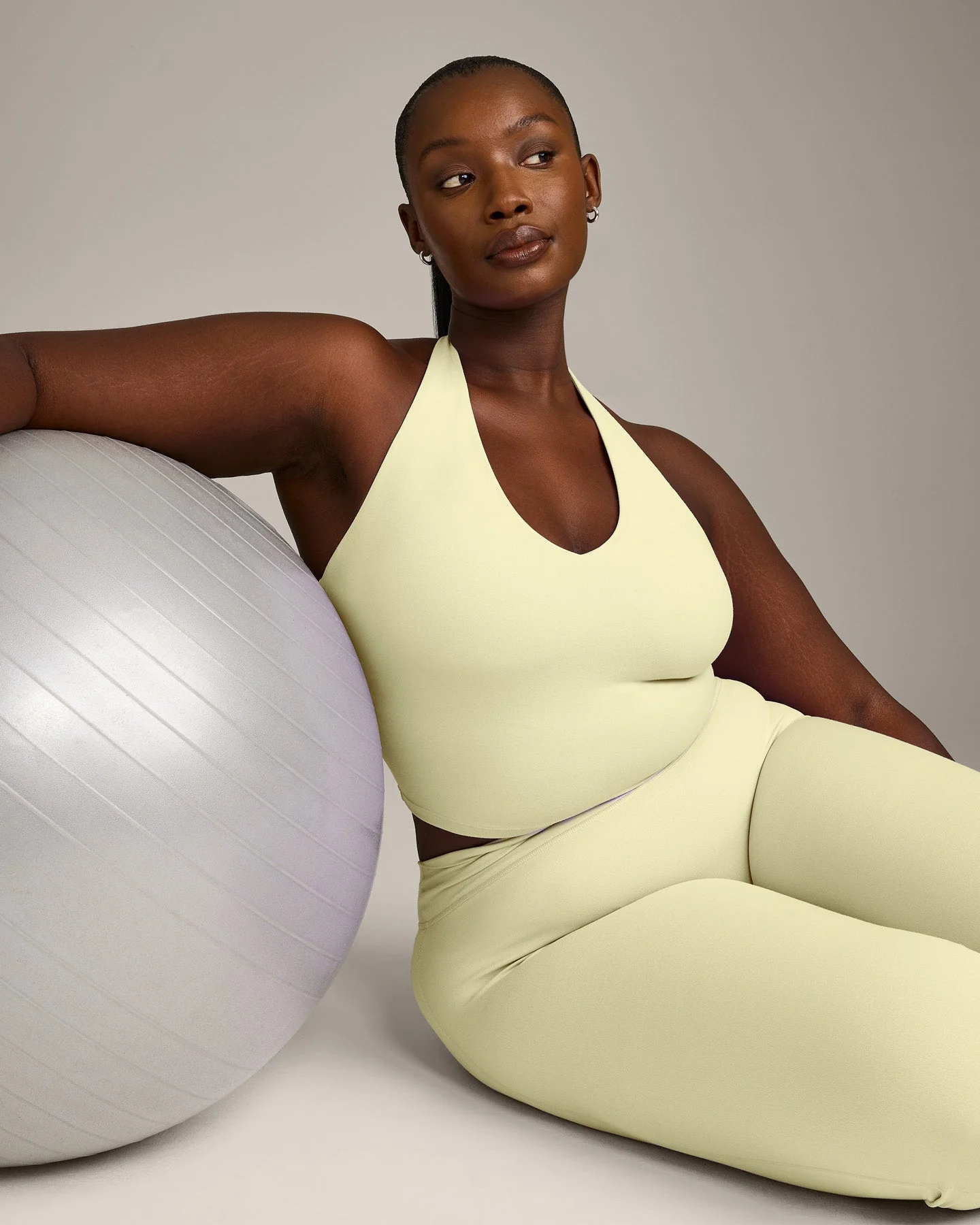 SoftMotion™ Halter Neck Mid Vest with Built in Bra Shelf with Grey Logo | Pastel Yellow - Image 5