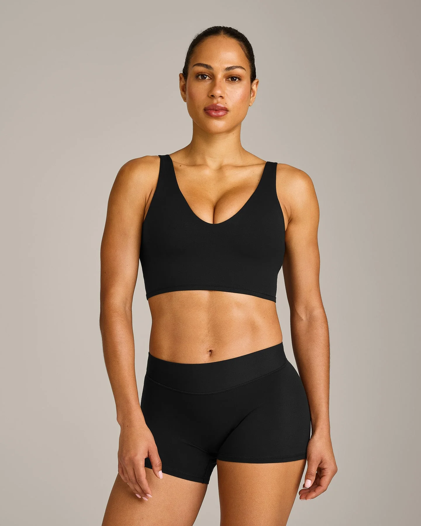 SoftMotion™ Longline Sports Bra with Grey Logo | Black