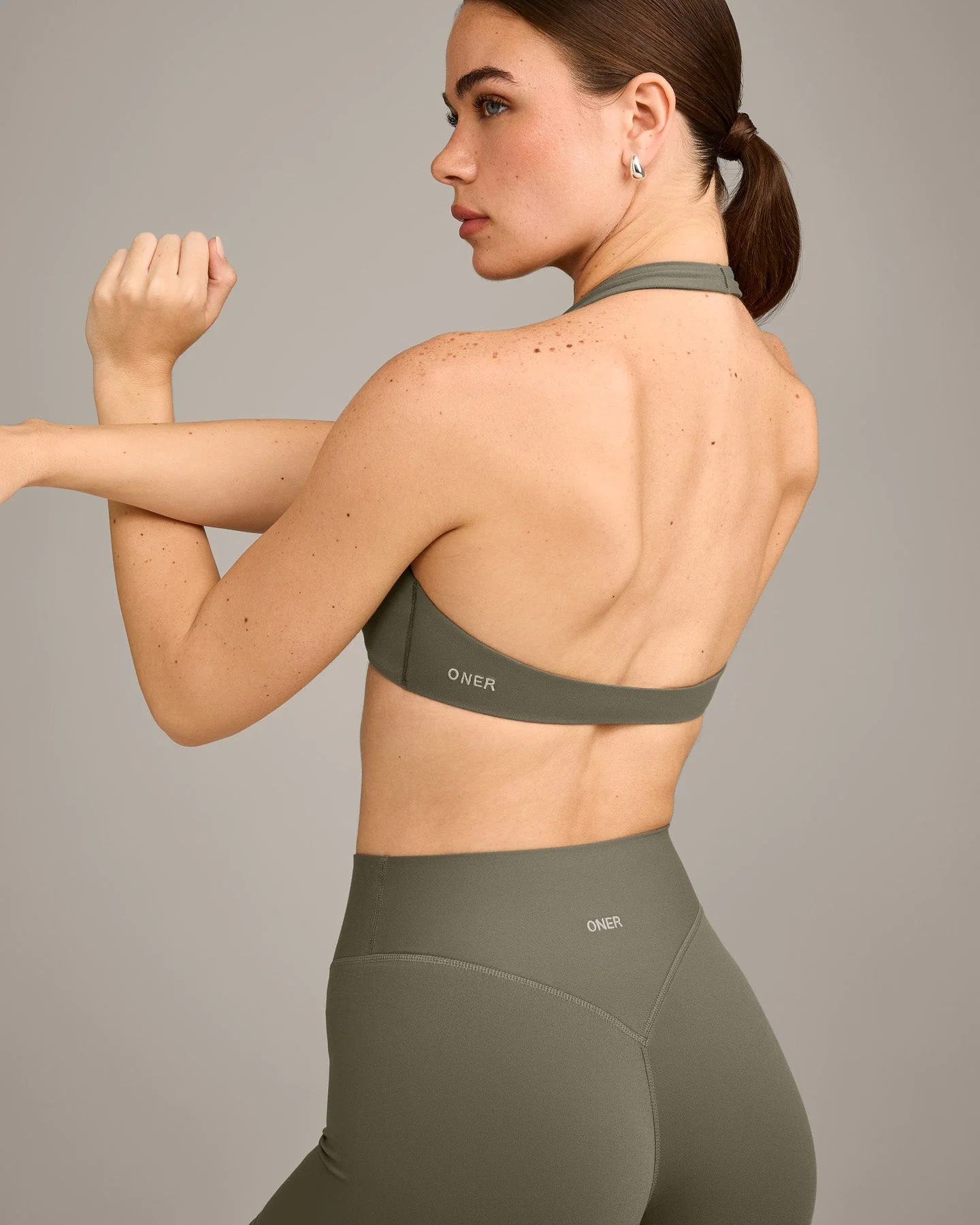 SoftMotion™ Minimal Halter Neck Bralette with Grey Logo | Alpine Green - Image 2