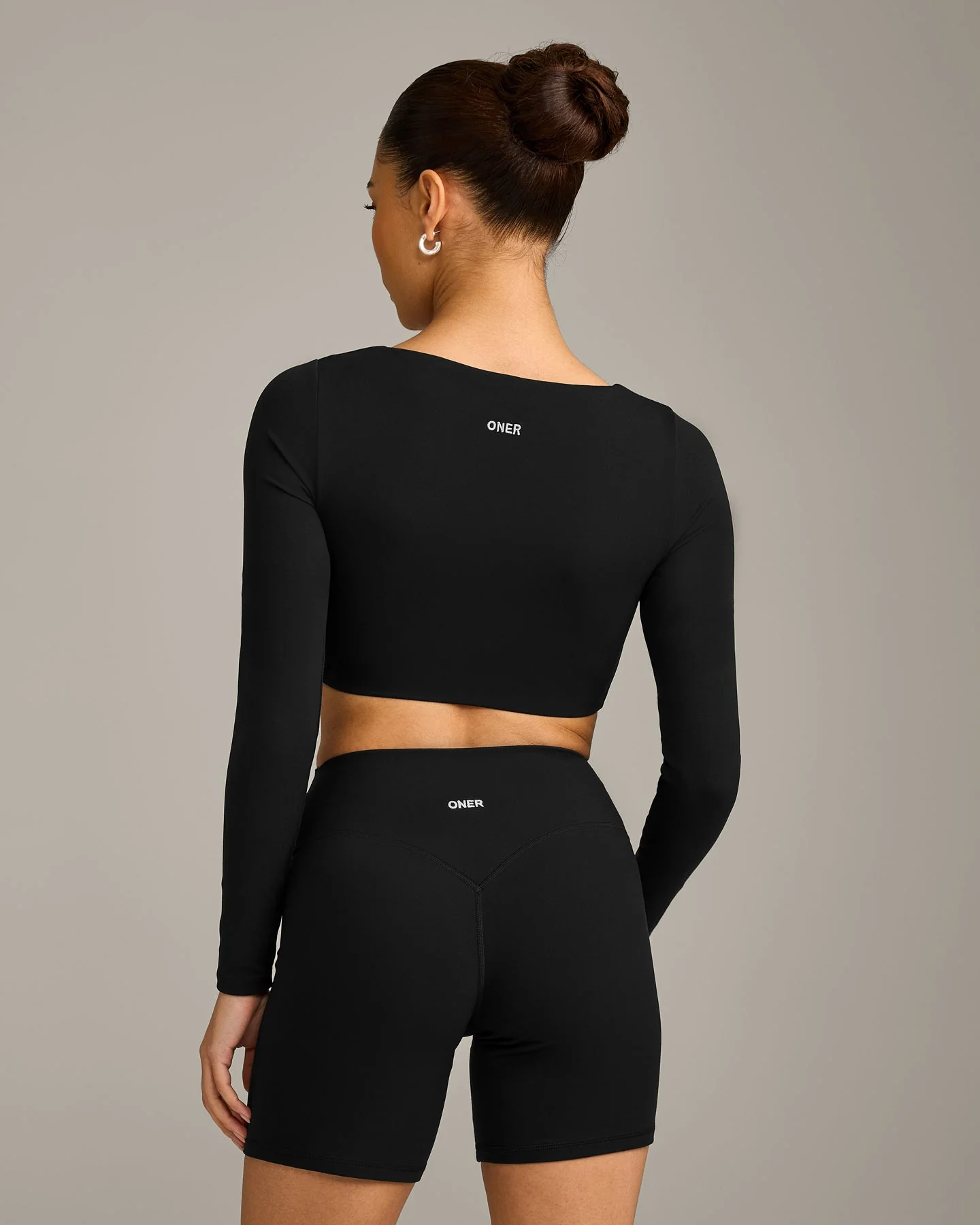 SoftMotion™ Scoop Neck Long Sleeve Crop Top with Built in Bra Shelf with Grey Logo | Black - Image 6