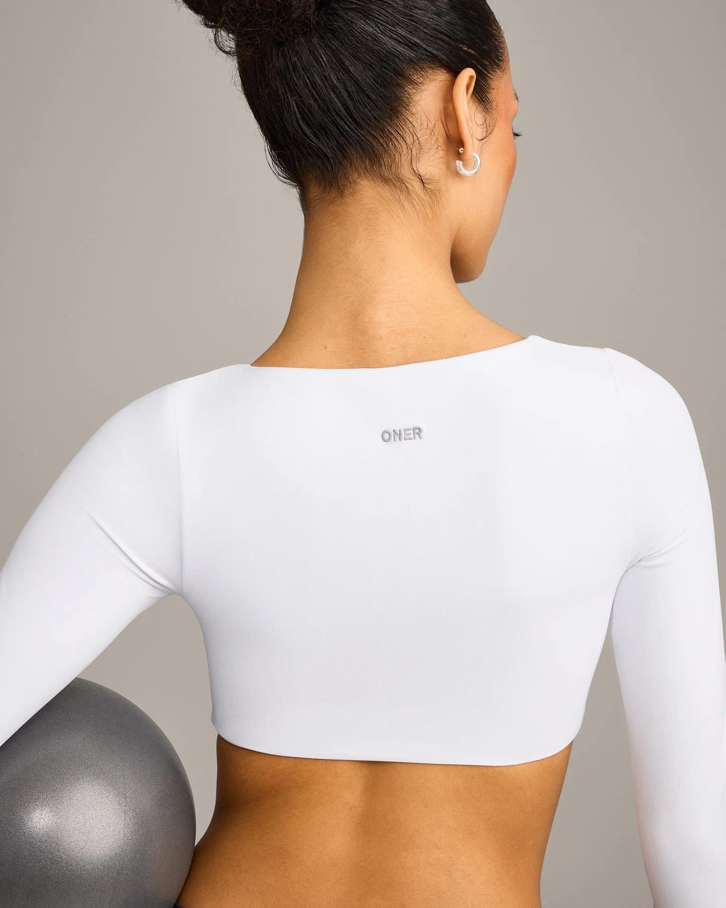 SoftMotion™ Scoop Neck Long Sleeve Crop Top with Built in Bra Shelf with Grey Logo | White - Image 4