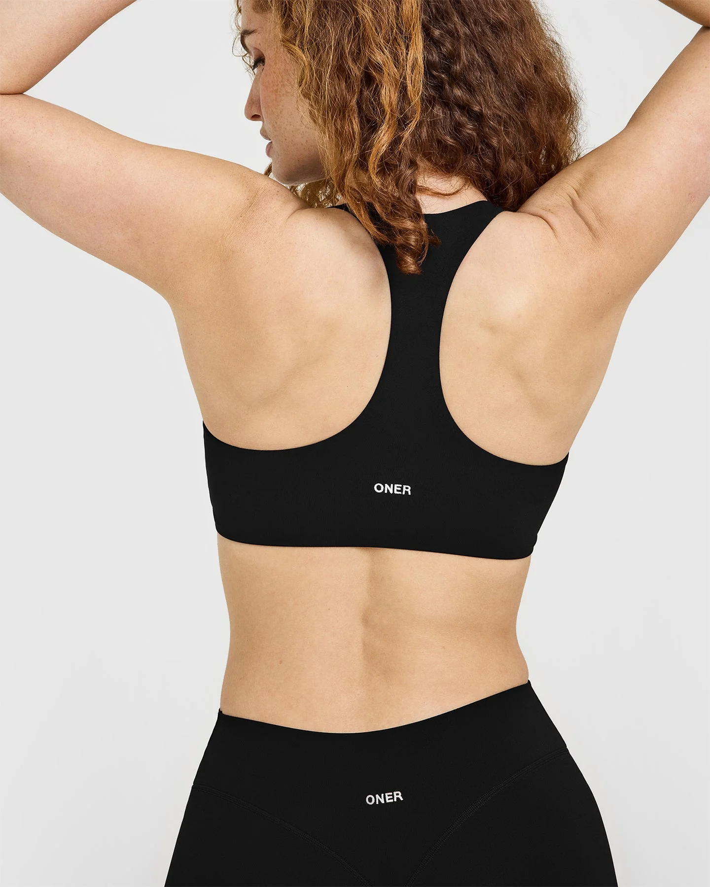 SoftMotion™ Sports Bra with White Logo | Black - Image 6