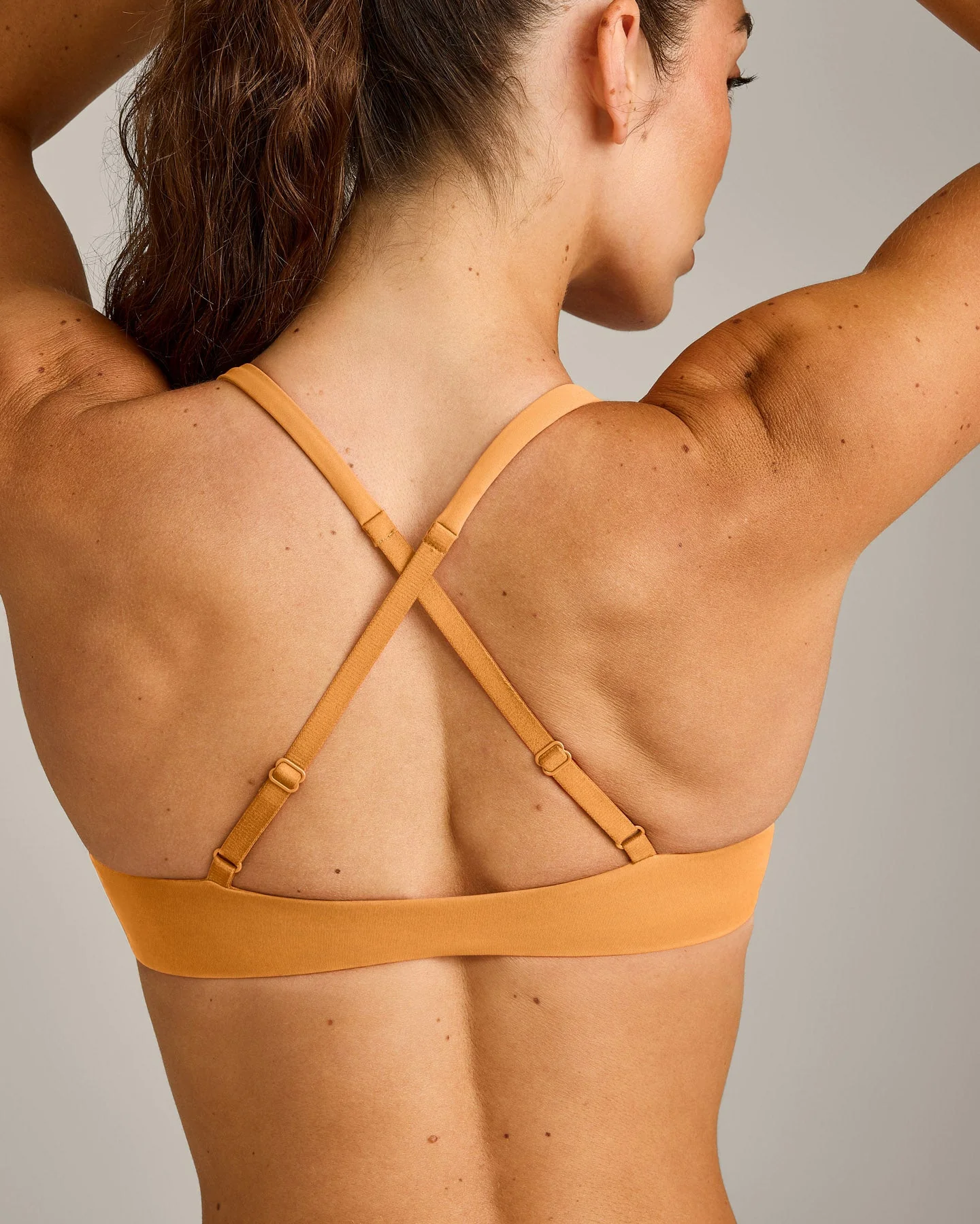 UnifiedMove™ Cross Back Sports Bra with Reflective Logo | Powdered Orange - Image 5