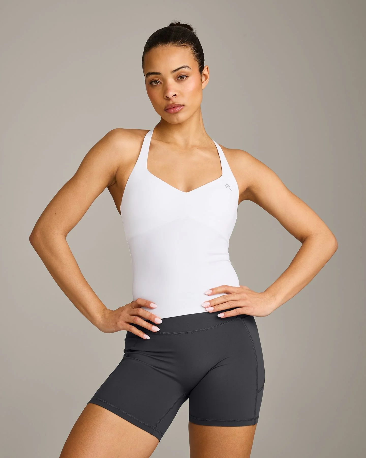 UnifiedMove™ T Back Mid Vest with Built in Bra Shelf with Reflective Logo | White